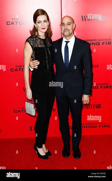 Actor Stanley Tucci (R) and wife Felicity Blunt attend "The Hunger ...