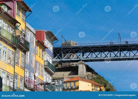 Typical Portuguese Buildings And Dom Luis I Bridge Editorial Stock