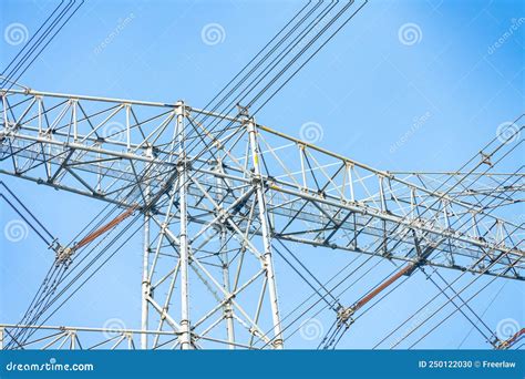 A High Voltage Power Pylon In A Day Time Horizontal Composition Stock