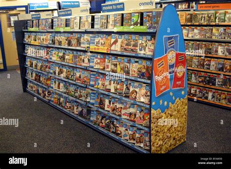 Shelf Units For Dvd Moviess For Rental Inside A Blockbuster Store Stock
