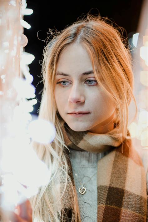 Photo Of Woman Wearing Multi Colored Sweater · Free Stock Photo