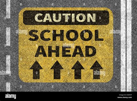 Road With School Ahead Caution Sign Stock Photo Alamy