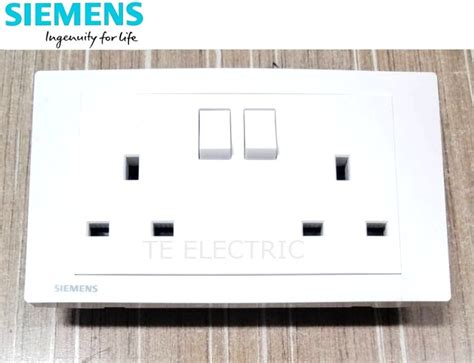 A Twin Gang Switched Socket Siemens Sirim Off