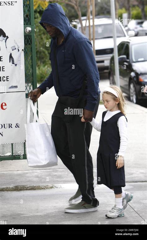 Top model Heidi Klum and musician husband Seal arrive to a karate class with their kids. Heidi ...