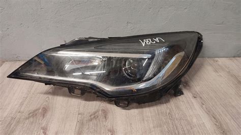 OPEL ASTRA V K LAMPA LEWA PRZEDNIA PRZÓD 39047198 39047198 za 180 zł z