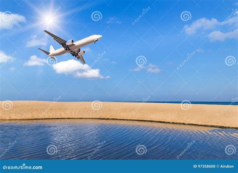 Passenger Airplane Flying Above Tropical Beach In Andaman Sea On Blue