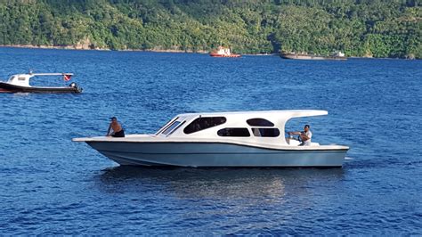 boat-side-view-Medium | Dive Into Lembeh