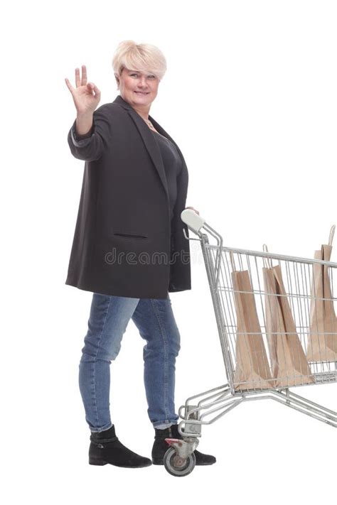 Full Length Casual Mature Woman With Shopping Cart Stock Photo Image