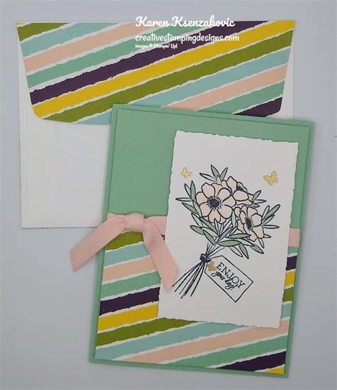 Two Cards With Flowers On Them Are Next To Each Other