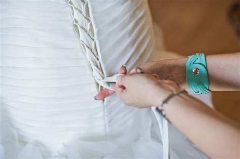 premium photo  bride wears  wedding dress