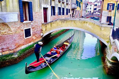 Venice: Shared Gondola Ride through the Lagoon City | GetYourGuide