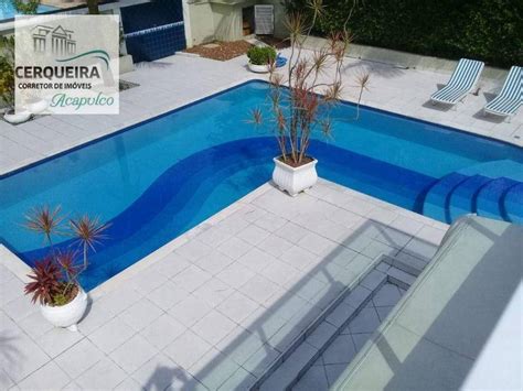 Casa na Rua Benedito Lauro de Camargo 7856 Jardim Acapulco em Guarujá