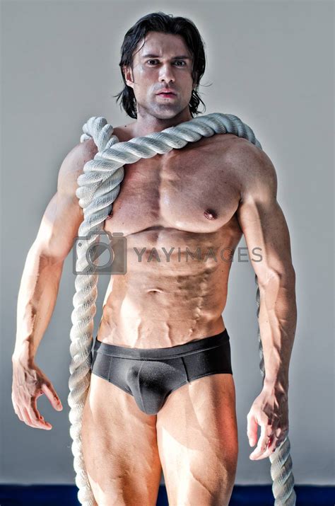 Muscular Man Nearly Naked With Heavy Big Rope Around Neck By