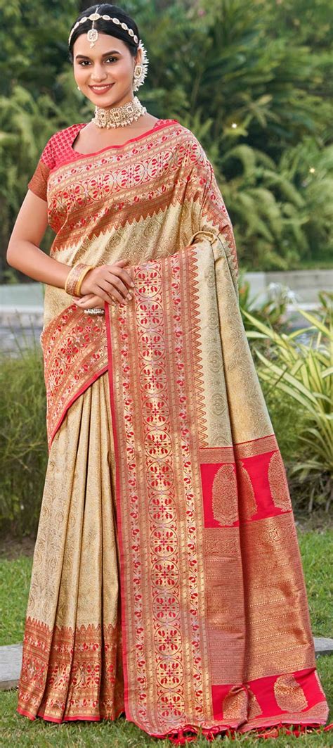 Festive Traditional Beige And Brown Pink And Majenta Color Kanjeevaram Silk Silk Fabric Saree