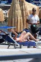Toni Collette Rocks An Orange Bikini For A Sexy Seaside Getaway In Ischia Aznude