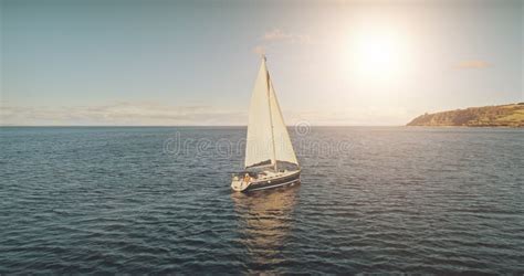 Sailing Yacht Race At Sun Light Aerial Yachting On Serene Seascape At