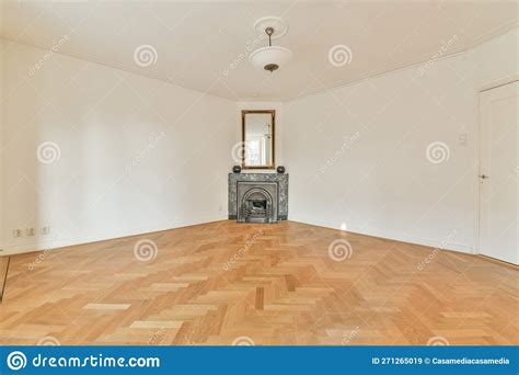 A Living Room with a Fireplace and a Wooden Floor Stock Image - Image ...