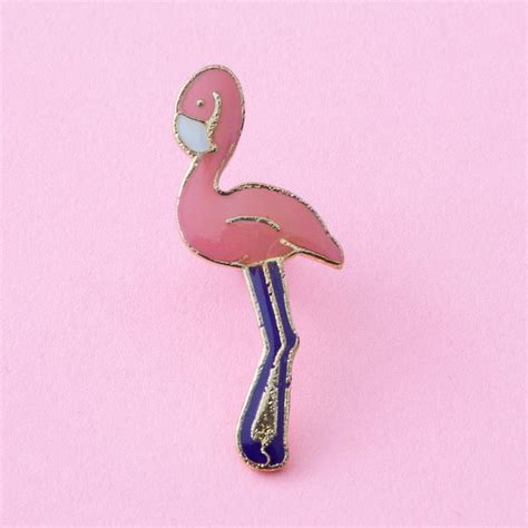 This Adorable Gold Tipped Flamingo Will Stand Pretty On Your Collar And