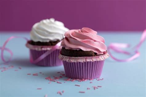 Free Photo | Colorful cupcakes with delicious frosting