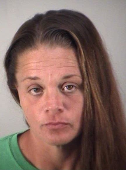 Woman Arrested After Running Red Light Nearly Causing Accident Near