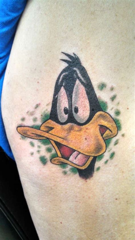 daffy duck mowing pubes tattoo - ut-austin-median-lsat