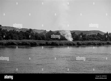 Bush Fire In Africa By The Nile River Stock Photo Alamy
