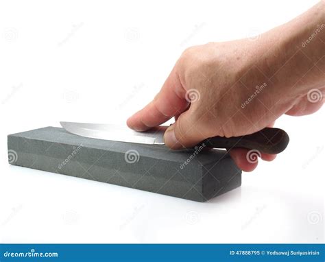 Honing a knife on white stock image. Image of honing - 47888795