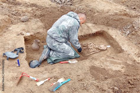 Archaeological Excavation The Archaeologist In A Digger Process