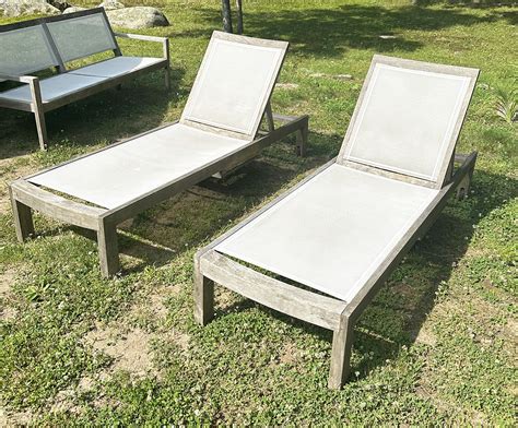 Pair Of Crate Barrel Regatta Teak And Natural Mesh Chaise Lounge