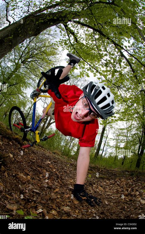 Young man falling off of bicycle dramatically Stock Photo, Royalty Free ...