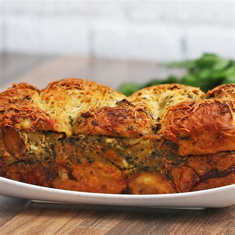 Pesto Chicken Stuffed Garlic Bread Recipe By Tasty