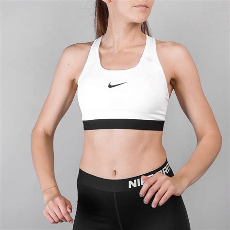 Женский топ Nike Pro Classic Padded Medium 823312 100 купить по цене 1200 руб в интернет