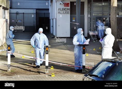 Team Of Police Forensic Officers At Albon House In Wandsworth Hi Res