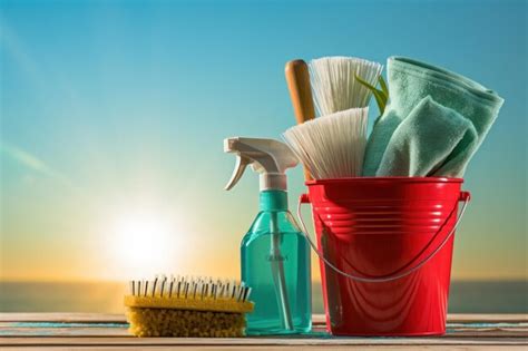 Premium Photo A Red Plastic Bucket Filled With Various Cleaning