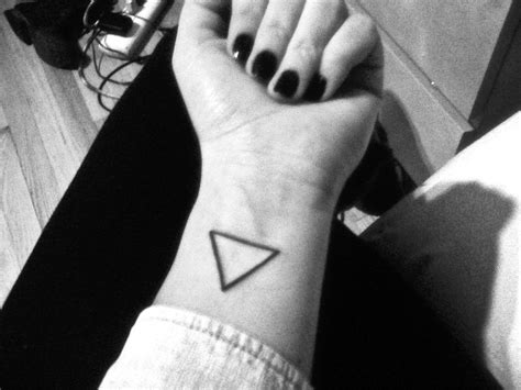 Simple black triangle tattoo | Best tattoo design ideas