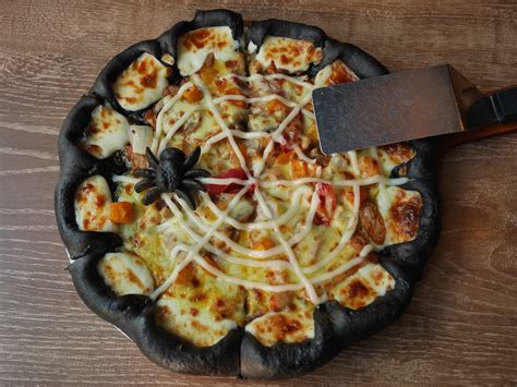 Pizza Hut Celebrates Halloween with a Spidery Black Pizza in China ...