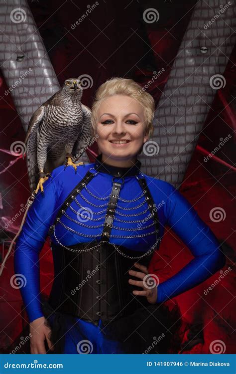 Beautiful Scary Woman With The Big Hawk Best Friend On The Background