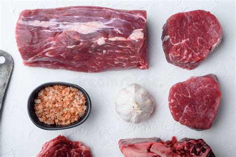 Tenderloin Steak Raw Beef Steak Cut On White Stone Background Top