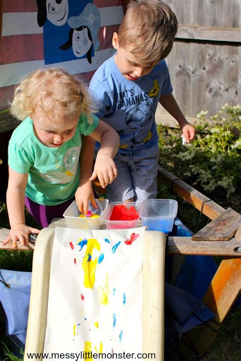 Paint Rolling On A Slide A Fun Outdoor Art Idea For Kids Preschool