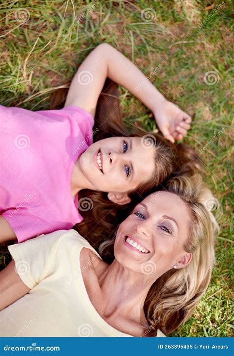 Theyve Got A Close Bond A Happy Mother And Her Young Daughter Lying On