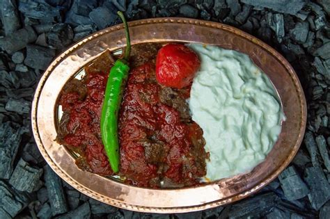 Premium Photo Turkish Meat Dish With Yogurt And Pepper