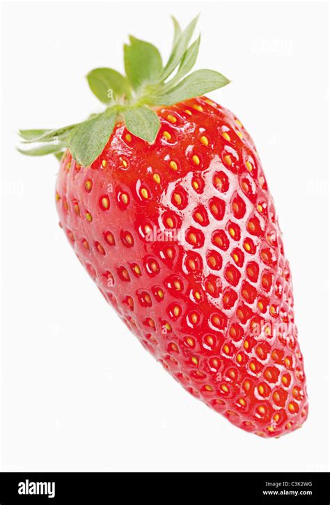 Strawberry against white background, close up Stock Photo - Alamy