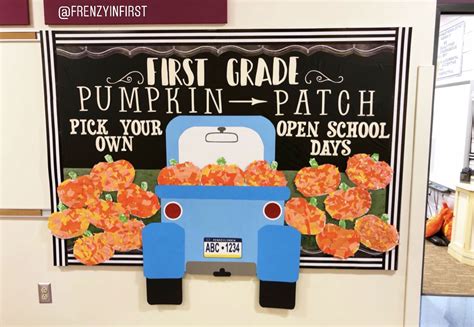 A Blue Truck With Orange Flowers On It Is Next To A Sign That Says First Grade Pumpkin Patch