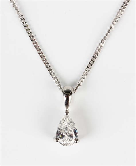 An Ct White Gold And Diamond Single Stone Pendant Claw Set With The