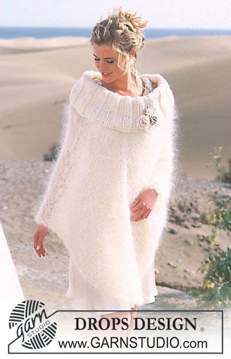 Drops Poncho In Vienna Or Melody And Eskimo With Crocheted Flowers In