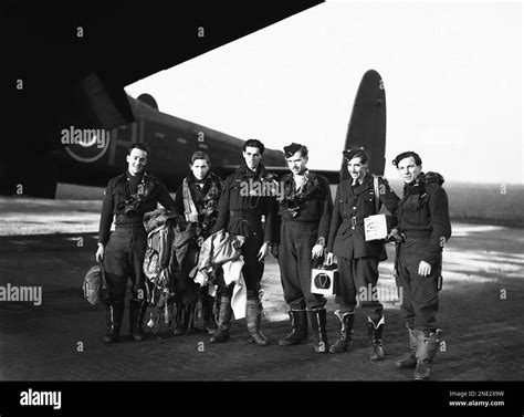 The crew of Lancaster bomber “H for Harry”, seen on their return from ...