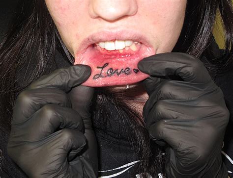 The Agony And Beauty Of Lip Tattoos