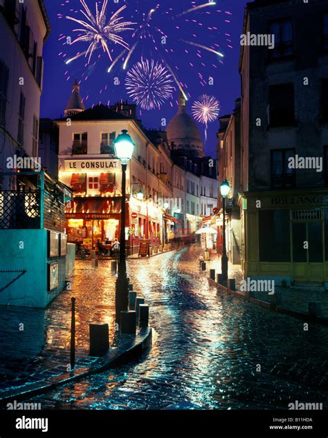 STREET SCENE OUTDOOR CAFES RUE NORVINS MONTMARTRE PARIS FRANCE Stock