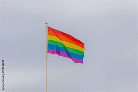 Celebration Of Pride Month Colourful Flags Hanging On The Pole In