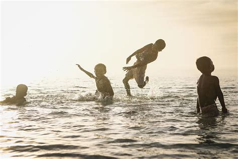 person playing ocean daytime children friends fun kids piqsels